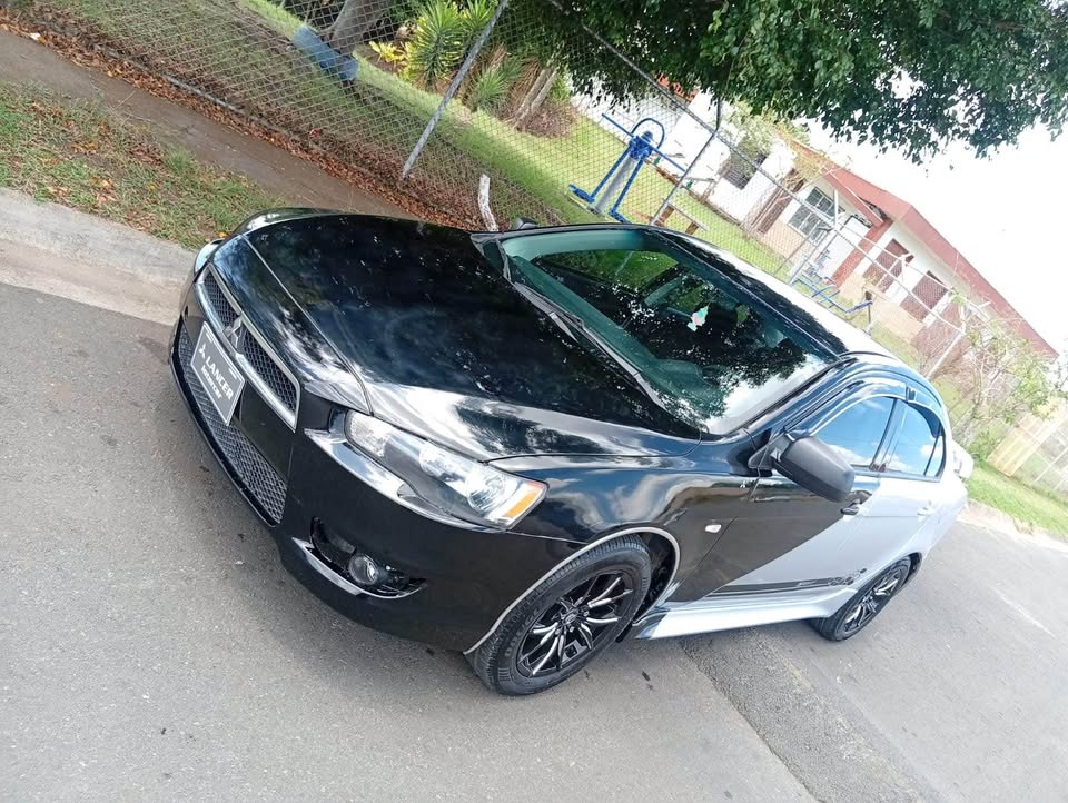 
								Mitsubishi Lancer 2013 full									